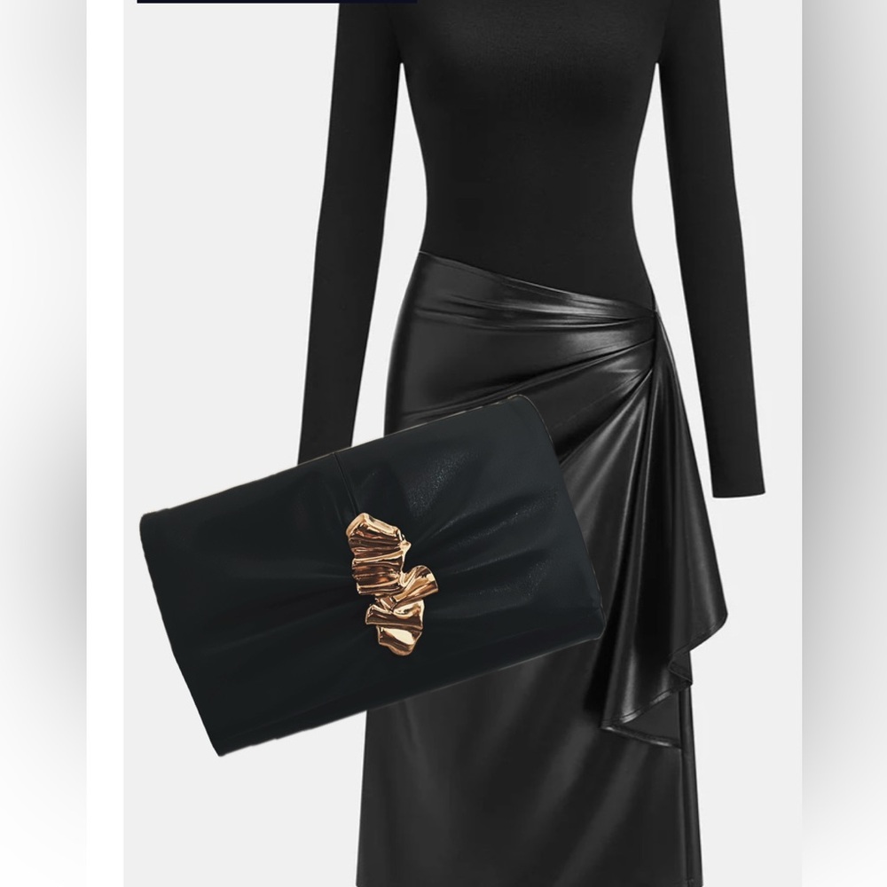 Italian leather clutch with Gold Ripple hardware with detachable long chain.